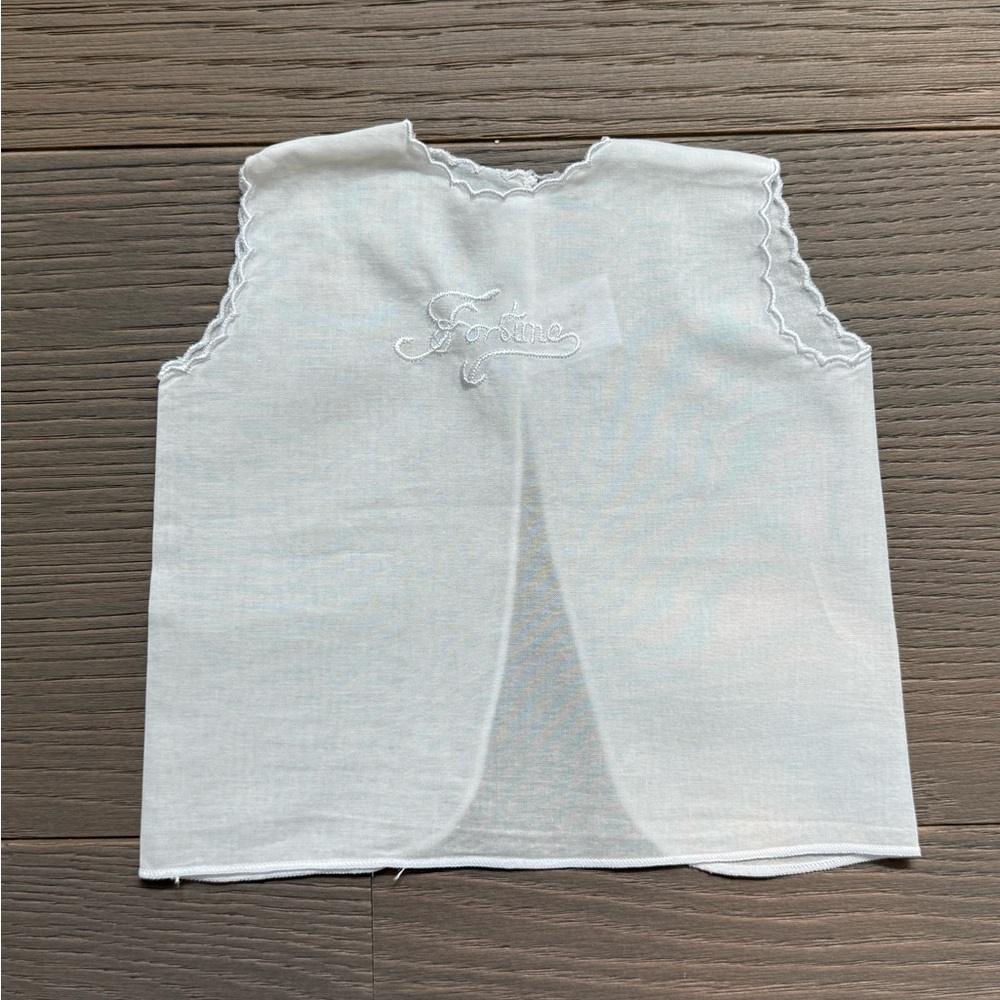 White Sleeveless Top with Embroidered Detail